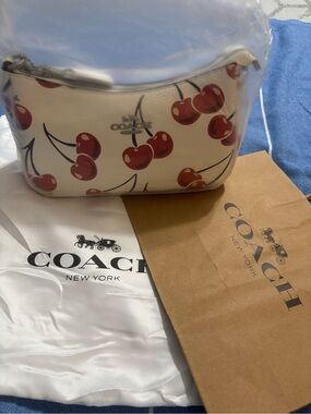 NWT Coach White Cherry Print Leather Crossbody Bag w Coach Cherry bag charm
